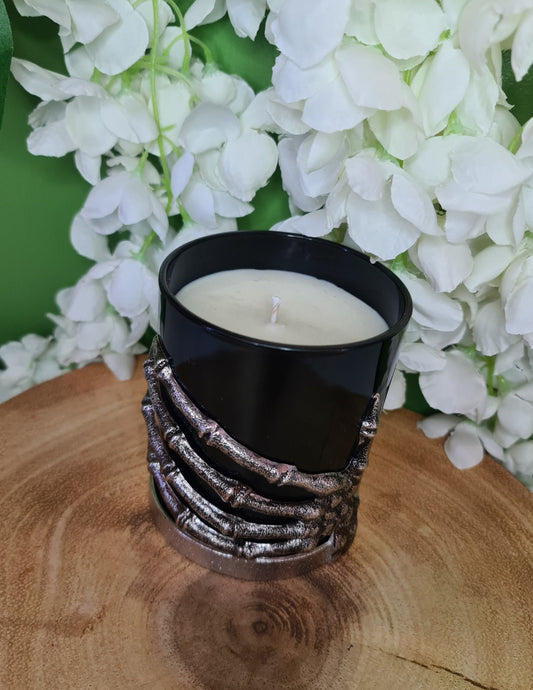 Skeleton Hand Candle scented with Forbidden Fruits