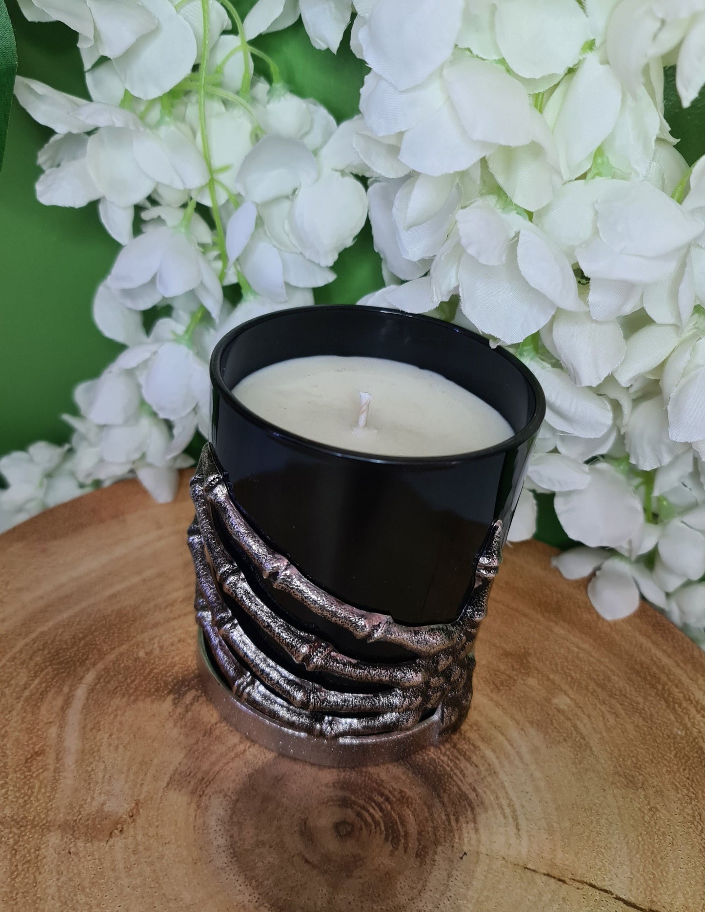 Skeleton Hand Candle scented with Forbidden Fruits